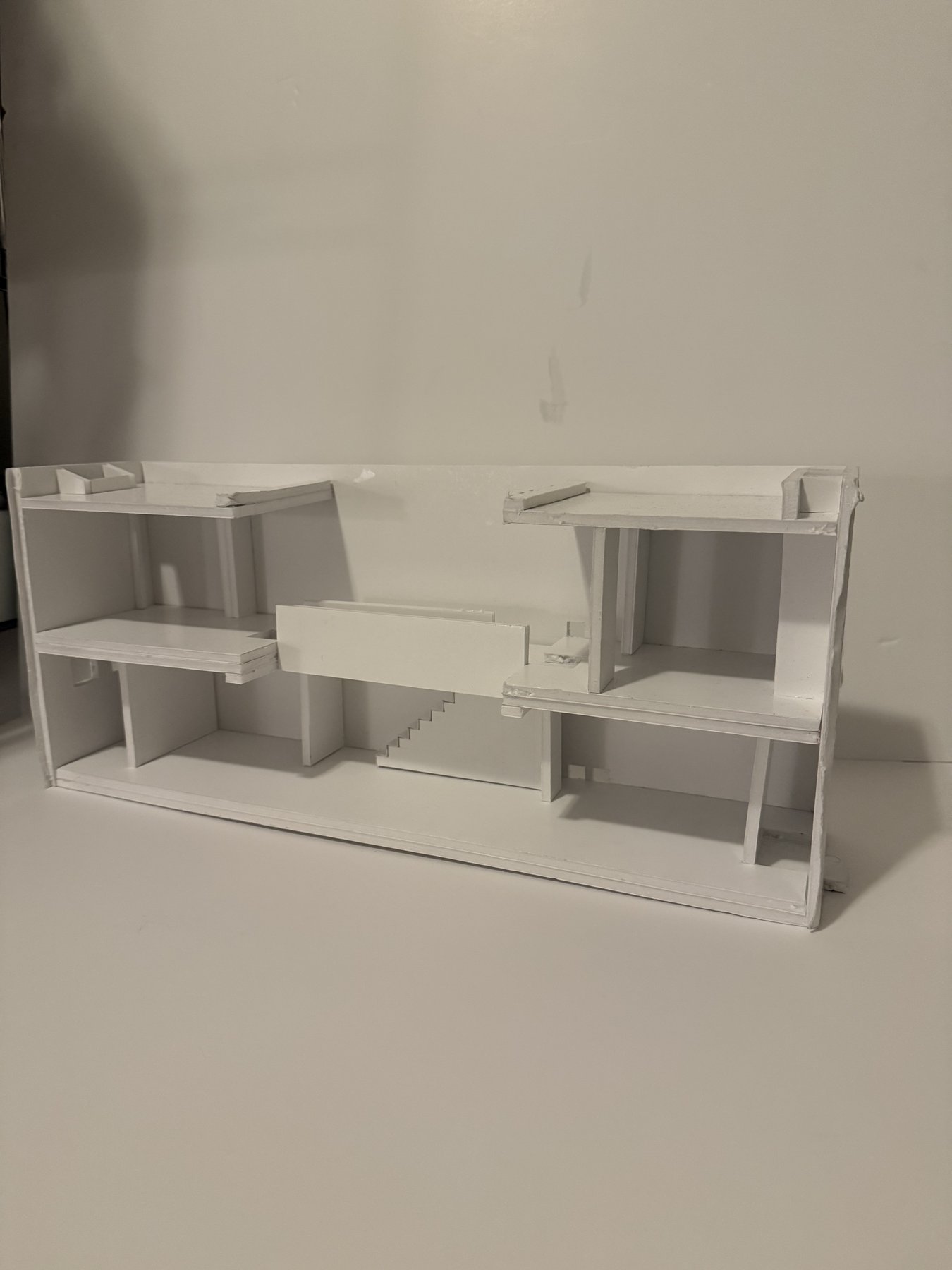 Physical study model of Tadao Ando's Row House in Sumiyoshi (Azuma House), full section view.