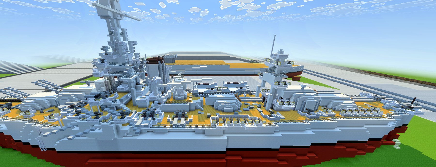 Close-up of USS New York's superstructure, cage masts, and gun turrets in voxel form.