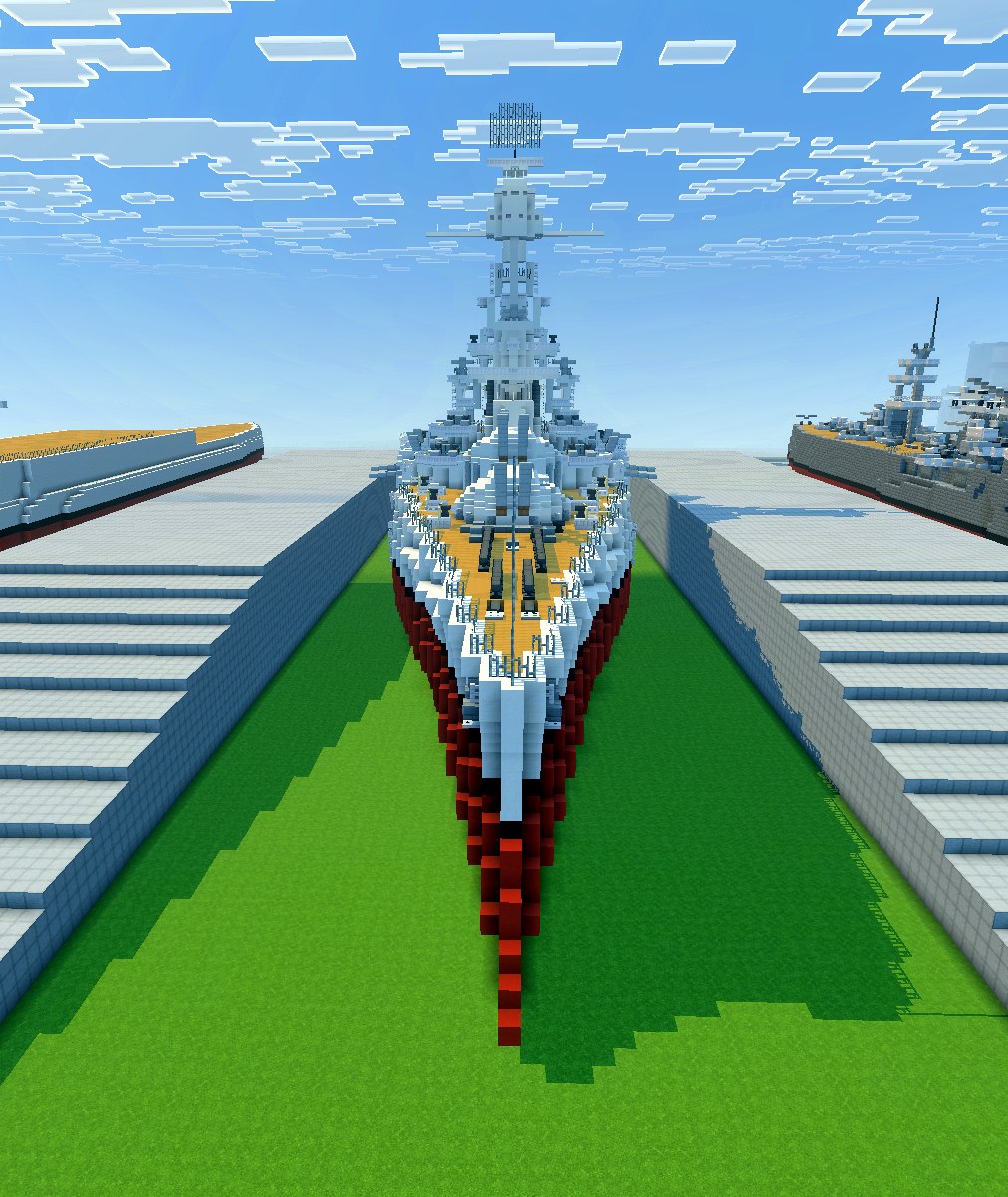 Bow-on view of USS New York in dry dock, with a second ship visible alongside.