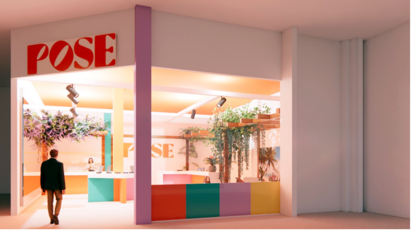 Storefront entrance view of the POSE pop-up with signage and hanging plants.